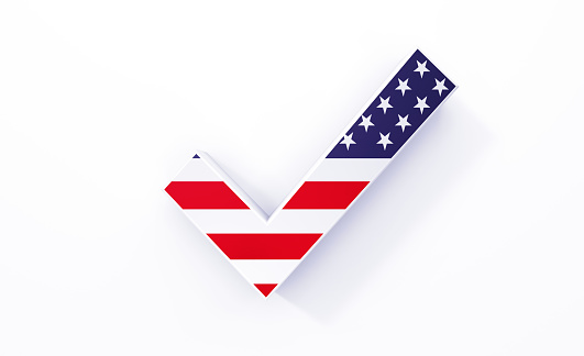 Extruded check mark symbol textured with American flag on white background. Horizontal composition with copy space. Clipping path is included.
