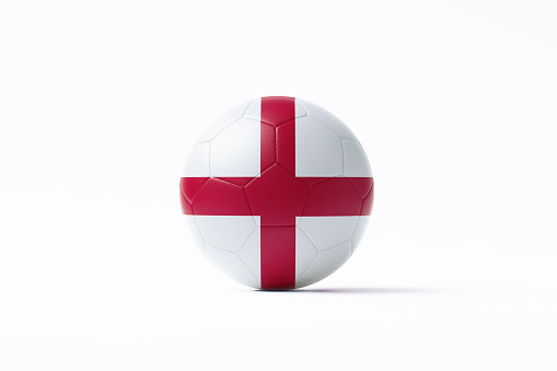 Soccer ball textured with English flag sitting on white background. Horizontal composition with copy space. Clipping path is included. Qatar 2022 World Cup qualifiers concept.