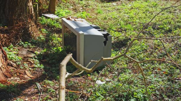 istock Old Damaged Garbage CRT TV Dumped Outdoors 1403400954