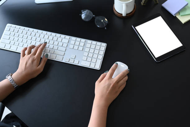 istock Overhead view businesswoman hand typing on keyboard, working at modern workplace. 1403405337