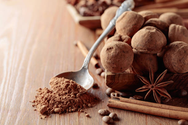 istock Chocolate truffles on a wooden table. 1403409368