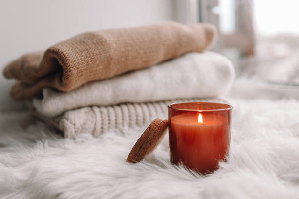 istock Candle on the windowsill. Autumn mood. 1403411216
