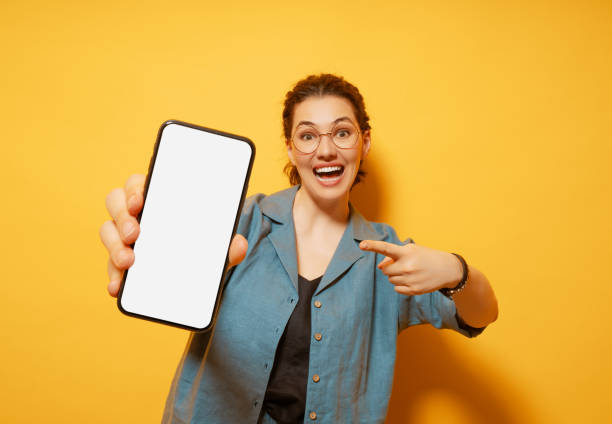 istock woman with smartphone 1403418290