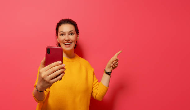 istock woman with smartphone 1403418427