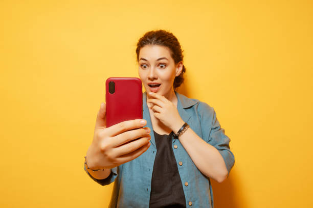 istock woman with smartphone 1403418437