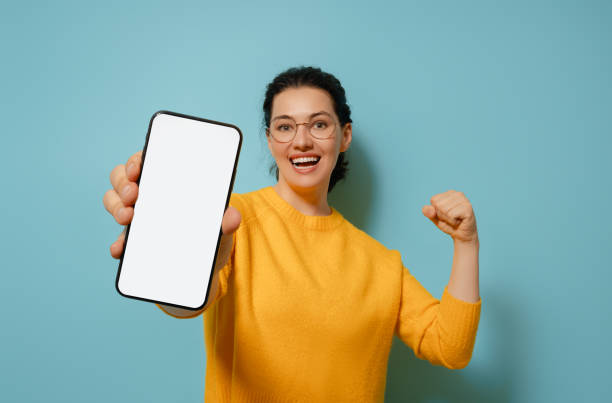 istock woman with smartphone 1403418455