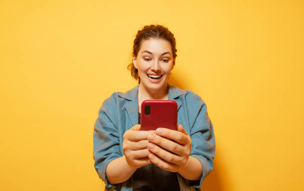 istock woman with smartphone 1403418456