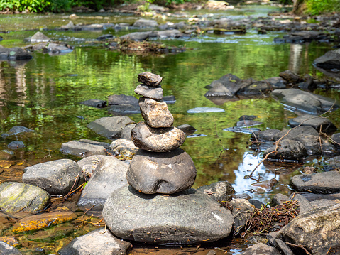 balance stones in the water