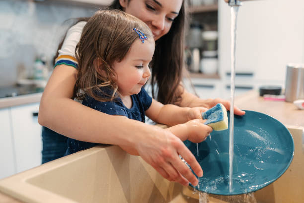 istock Mom with toddler in the kitchen 1403422715