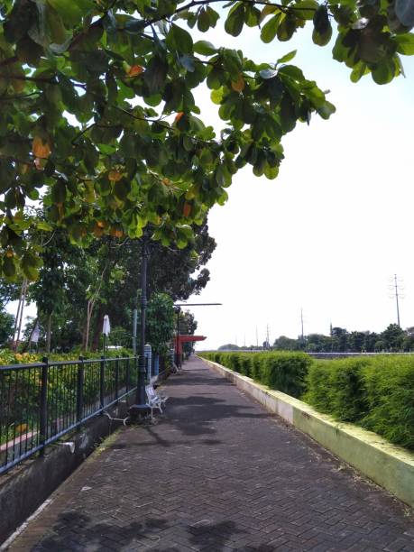 istock a footpath built along the Pleret river channel, Semarang city 1403422745