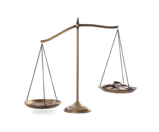 istock Scales with coins on white background. Harmony and balance concept 1403426424