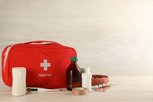 istock First aid kit on white wooden table, space for text 1403426956