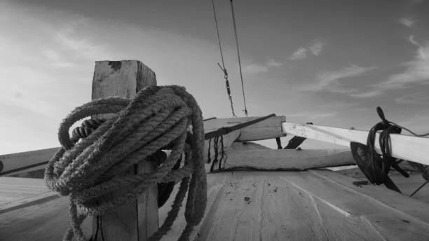 istock Ship ropes are used to lean in the harbor. 1403429455