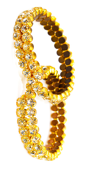 A picture of gold plated diamond bracelets with selective focus