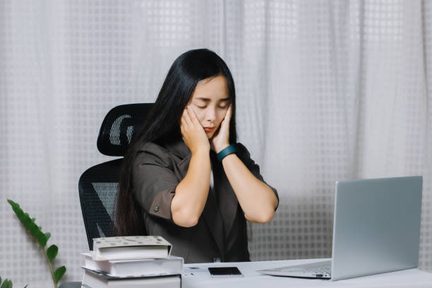 istock serious businesswoman working with working on labtop 1403431162