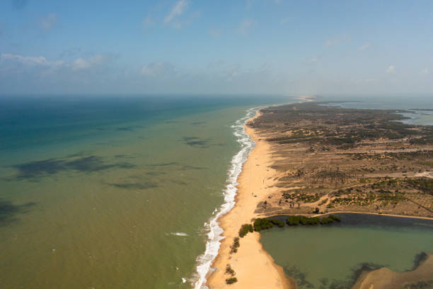 istock Wide sandy beach with ocean surf and waves. Sri Lanka. 1403438659