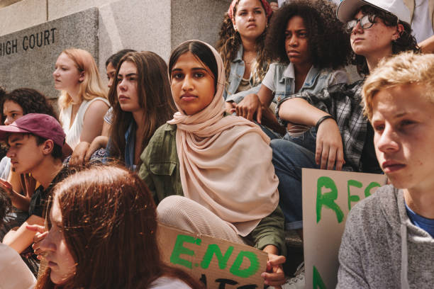 istock Multicultural youth activists fighting against climate change 1403441109