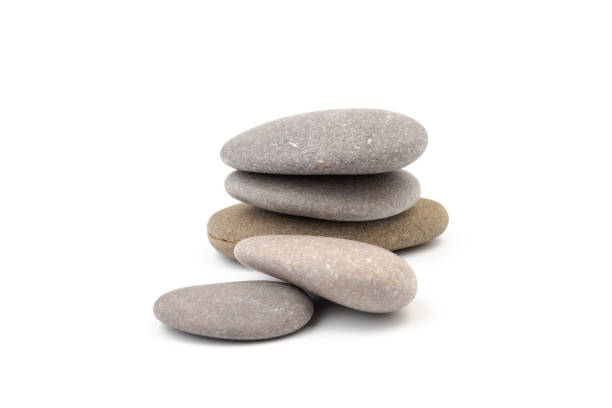 istock Zen stones on a light background. Minimalistic concept. Zen balance miditation concept. For branding and product presentation. 1403451436