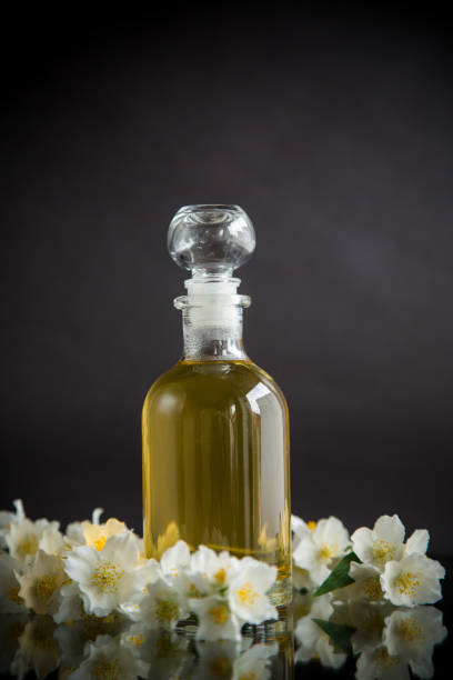 medicinal herbal tincture with jasmine in a glass bottle