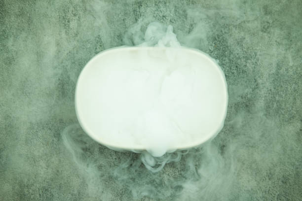 Dry ice smoke on cup. Cooling beverage Dry ice smoke on cup. Cooling beverage and impressive effect concept fog transparent stock pictures, royalty-free photos & images