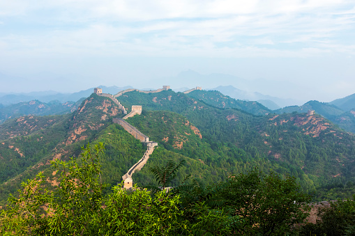 Great Wall of China flowing over a mountain range near Simatai