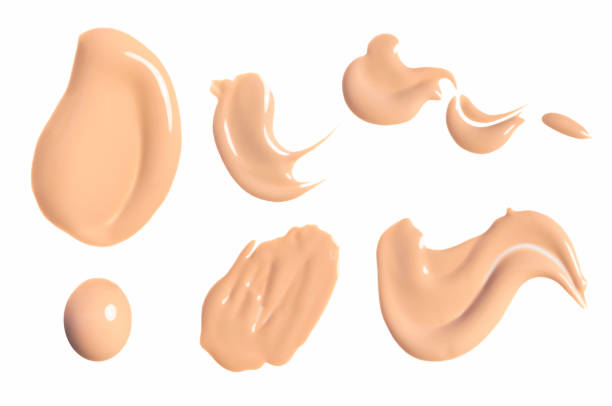 istock Set of brush strokes for makeup bb cream isolated on white background. Foundation face make-up samples, texture of face concealer. Make up smears, cosmetic, foundation colors palette. Mock up 1403468509