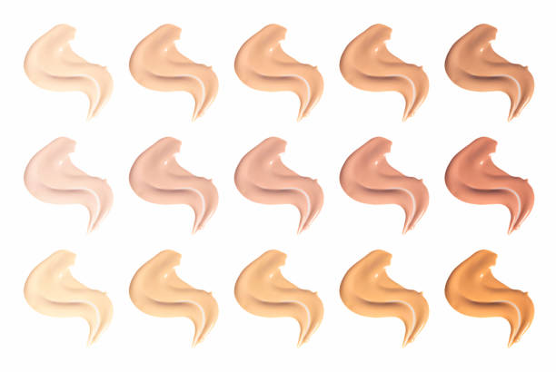 istock Set of brush strokes for makeup in different colour isolated on white background. Foundation face make-up samples, texture of face concealer. Make up smears, bb cream, cosmetic, foundation colors 1403468529