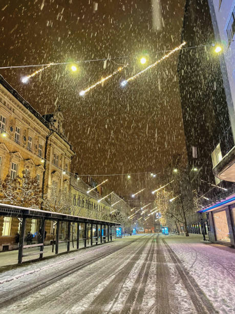 bright christmas lights create a beautiful atmosphere in downtown ljubljana. - ljubljana december winter christmas imagens e fotografias de stock