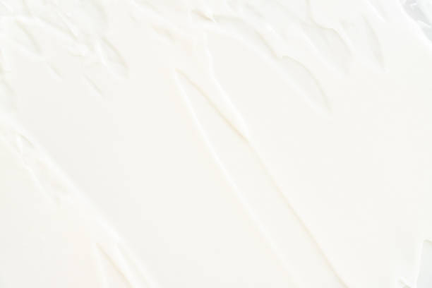 istock face and body cream. Texture cosmetics. Skincare product close up. Copy space 1403473404