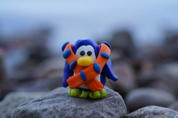 istock A toy penguin in a scarf. 1403474553