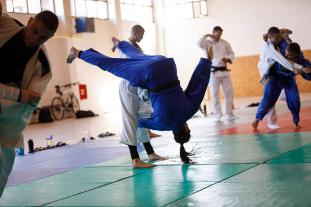 istock Martial arts fighters training together 1403476284