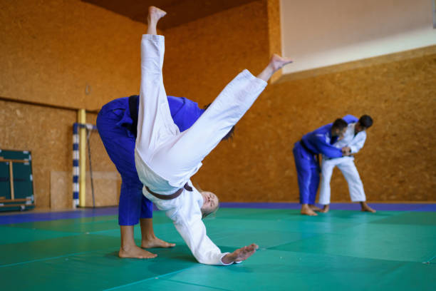istock Sparing partners practicing judo in the gym 1403477127