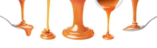 set drip of caramel on white background stock photo