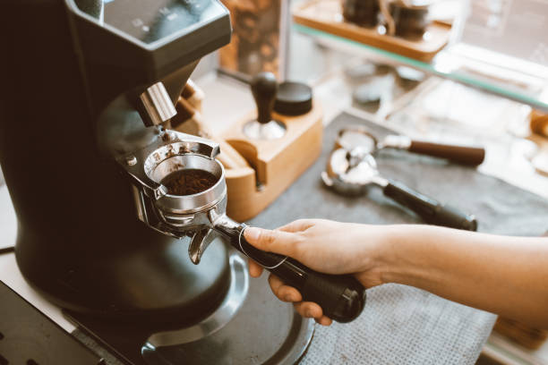 istock Barista making coffee with professional machine, Coffee pouring into a cup, small business, startup business. 1403478547