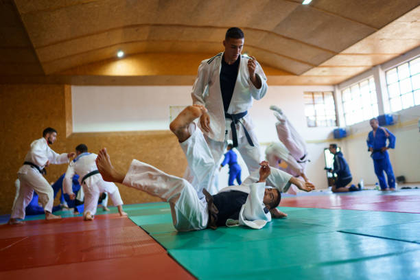 istock Martial arts fighters training together 1403478947