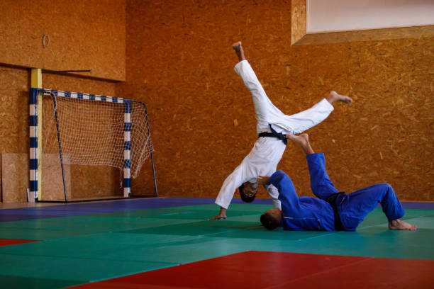 istock Two male judokas in a fight 1403479498