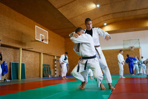 istock Martial arts fighters training together 1403480594