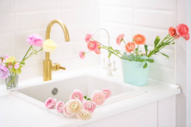 istock Perfect white kitchen interior with  fresh flowers 1403484624