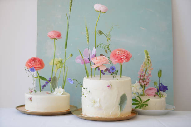 istock Luxury wedding cakes with original stylish modern decor on a vintage background 1403484633