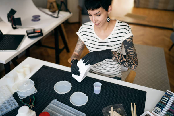 istock Caucasian craft woman working in her home workshop 1403486303