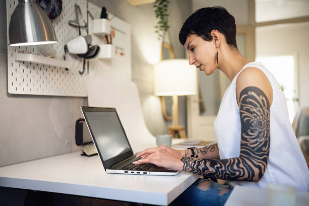 istock Female small business owner, working on laptop from studio 1403488465