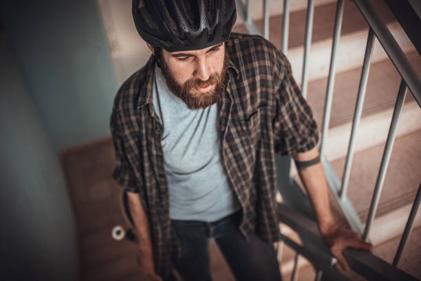 istock Skater walking up the steps 1403488673
