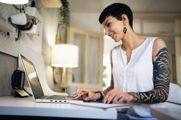 istock Female small business owner, working on laptop from studio 1403488714