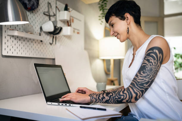 istock Female small business owner, working on laptop from studio 1403488715