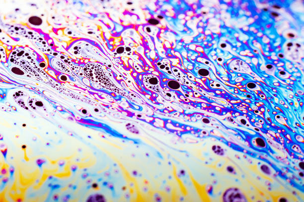 istock Beautiful psychedelic abstraction formed by light on the surface of a soap bubble 1403495848