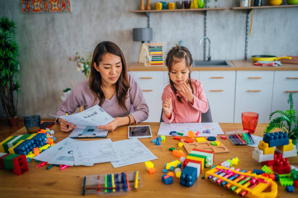istock Mother checking and calculating her finances 1403496203