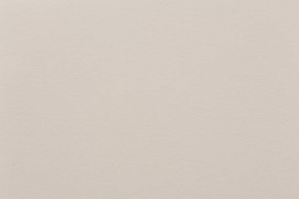 istock Soft beige handmade paper texture close-up. 1403497323