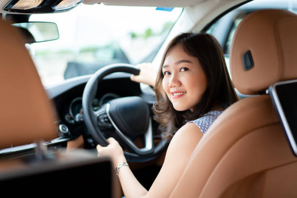 istock Woman driving a car. 1403497394