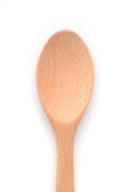 istock Wooden spoon on white background 1403500462