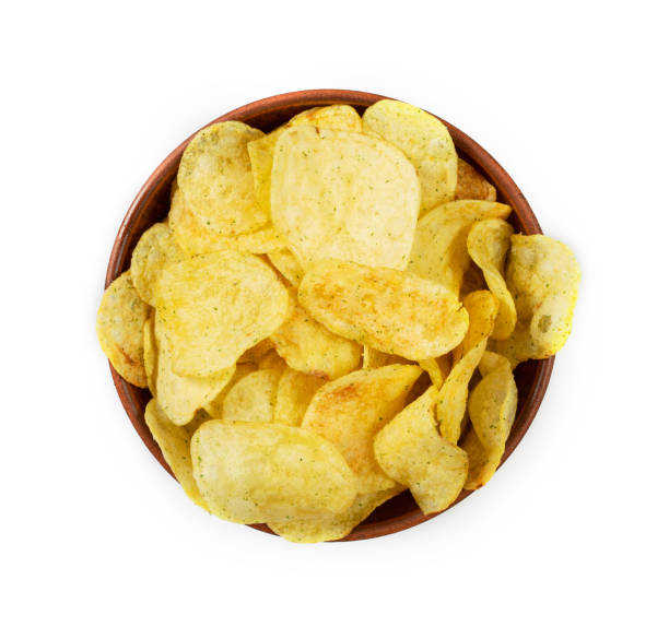 istock Potato chips in a wooden bowl isolated on white background 1403505800